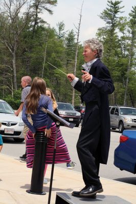 Last Day of School
June 19 was the last day of school at RMS, and the teachers and staff celebrated with their traditional student sendoff. Conductor Danni Kleiman led the teachers in song as the busses full of waving students looped around the parking lot before heading off toward summer break. Photos by Jean Perry
