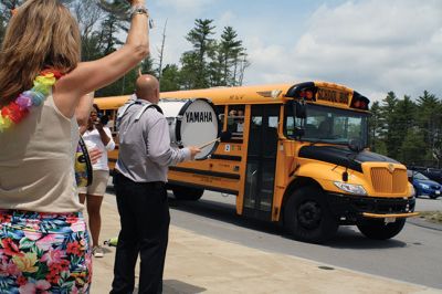 Last Day of School
June 19 was the last day of school at RMS, and the teachers and staff celebrated with their traditional student sendoff. Conductor Danni Kleiman led the teachers in song as the busses full of waving students looped around the parking lot before heading off toward summer break. Photos by Jean Perry
