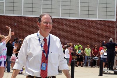Last Day of School
June 19 was the last day of school at RMS, and the teachers and staff celebrated with their traditional student sendoff. Conductor Danni Kleiman led the teachers in song as the busses full of waving students looped around the parking lot before heading off toward summer break. Photos by Jean Perry

