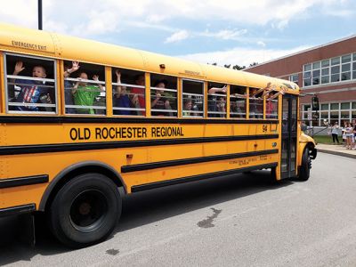 Rochester Memorial School 
As the school doors opened at Rochester Memorial School on the afternoon of Friday, June 14, teachers and administration carried on the tradition of playing instruments as a final farewell to the students as the school buses circled the parking lot, honking, as students laughed, waved, and cheered. Photos by Michelle Lynds
