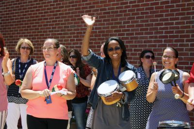 Fare Thee Well
Danni Kleimann led the school staff one last time on Wednesday, June 21, for the annual RMS student send-off. This year, the day marked Kleimann’s last day at RMS as she is retiring after 31 years. Kleimann is best known for directing the Shakespeare plays at RMS and for orchestrating the student send-off every summer. Kleimann passed her baton on to sixth grade teacher Tracy Forns to carry out the traditions. Photos by Jean Perry
