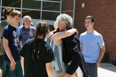 Fare Thee Well
Danni Kleimann led the school staff one last time on Wednesday, June 21, for the annual RMS student send-off. This year, the day marked Kleimann’s last day at RMS as she is retiring after 31 years. Kleimann is best known for directing the Shakespeare plays at RMS and for orchestrating the student send-off every summer. Kleimann passed her baton on to sixth grade teacher Tracy Forns to carry out the traditions. Photos by Jean Perry
