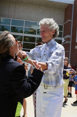 Fare Thee Well
Danni Kleimann led the school staff one last time on Wednesday, June 21, for the annual RMS student send-off. This year, the day marked Kleimann’s last day at RMS as she is retiring after 31 years. Kleimann is best known for directing the Shakespeare plays at RMS and for orchestrating the student send-off every summer. Kleimann passed her baton on to sixth grade teacher Tracy Forns to carry out the traditions. Photos by Jean Perry
