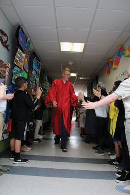 Senior Walk
Seniors from ORR took their annual senior walk on May 31, an event that takes the students from each of the Tri-Towns and sends them back to their home elementary schools for a nostalgic walk through the halls one last time as students. Pictured here are the Rochester students enjoying a last visit to Rochester Memorial School. Photos by Jean Perry
