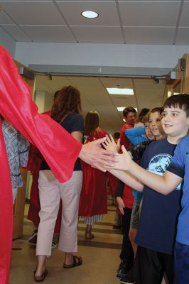 Senior Walk
Seniors from ORR took their annual senior walk on May 31, an event that takes the students from each of the Tri-Towns and sends them back to their home elementary schools for a nostalgic walk through the halls one last time as students. Pictured here are the Rochester students enjoying a last visit to Rochester Memorial School. Photos by Jean Perry
