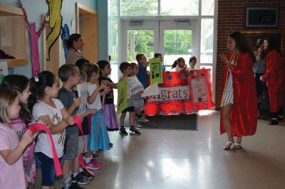 RMS Class of 2012
Rochester Memorial School welcomed back its RMS Class of 2012, with young students lining the halls to watch the big kids pass through one last time as students. Photos by Jean Perry
