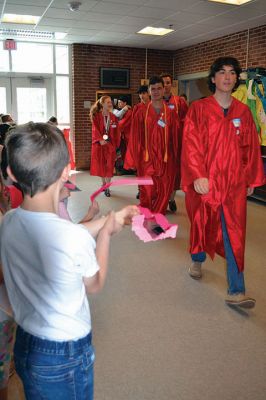 RMS Class of 2012
Rochester Memorial School welcomed back its RMS Class of 2012, with young students lining the halls to watch the big kids pass through one last time as students. Photos by Jean Perry
