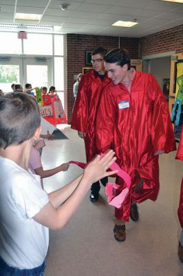 RMS Class of 2012
Rochester Memorial School welcomed back its RMS Class of 2012, with young students lining the halls to watch the big kids pass through one last time as students. Photos by Jean Perry
