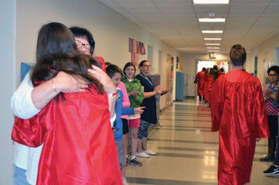 RMS Class of 2012
Rochester Memorial School welcomed back its RMS Class of 2012, with young students lining the halls to watch the big kids pass through one last time as students. Photos by Jean Perry
