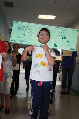 Vocabulary Day Parade
A living, breathing, (and giggling) dictionary of vocabulary words displayed their intellect and imagination at Rochester Memorial School during its first annual Vocabulary Day Parade on April 4. Photo by Jean Perry
