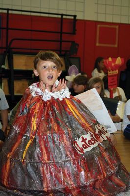 Vocabulary Day Parade
A living, breathing, (and giggling) dictionary of vocabulary words displayed their intellect and imagination at Rochester Memorial School during its first annual Vocabulary Day Parade on April 4. Photo by Jean Perry
