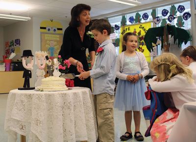  “Q” and “U” 
Deborah Bacciocchi’s kindergarten class at RMS celebrated a wedding of “Q” and “U” on May 16. The bride (a wooden letter "Q") wore a gown sewn with pieces from Bacchiocchi’s wedding gown and the groom wore mixed media/Sharpie formalwear. The gift registry yielded essentials like quarters, quilts, queens, and quartz, all elaborately wrapped by the kids. The reception followed with music, dancing, and cake. Photos by Erin Bednarczyk
