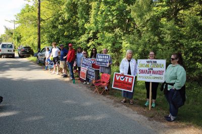 Election Day 
May 25 was Election Day in the Town of Rochester, and candidates and their ardent supporters lined Dexter Lane to greet and thank voters driving to and from the Senior Center. Photos by Mick Colageo
