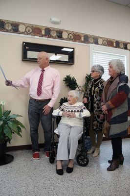 Boston Post Cane 
Mary Bellotti receives the Boston Post Cane from Rochester Select Board Chairman Woody Hartley on January 5 at the Senior Center. Bellotti, 103, is the oldest Rochester resident and latest recipient of the state-organized honor that goes to the oldest resident of participating Massachusetts municipalities. Bellotti is flanked by her daughters Susan Silva and Marie Crompton. Photo by Mick Colageo
