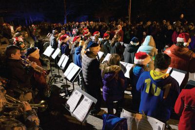 Rochester Christmas Tree Lighting
Rochester held its annual tree lighting on Monday night, December 7, in front of the Town Hall. Hundreds attended and greeted jolly old Saint Nick as he rode in on the town’s new yellow fire tower truck. RMS students in the band and chorus sang Christmas carols and guests enjoyed complimentary cider and cocoa inside Town Hall afterwards. Photos by Colin Veitch
