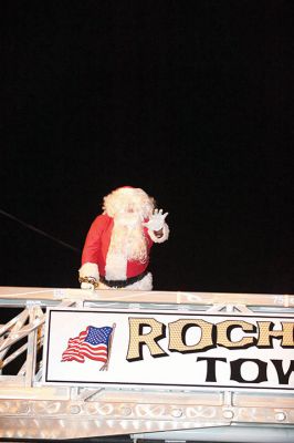 Rochester Christmas Tree Lighting
Rochester held its annual tree lighting on Monday night, December 7, in front of the Town Hall. Hundreds attended and greeted jolly old Saint Nick as he rode in on the town’s new yellow fire tower truck. RMS students in the band and chorus sang Christmas carols and guests enjoyed complimentary cider and cocoa inside Town Hall afterwards. Photos by Colin Veitch
