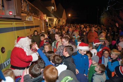 Rochester Christmas Tree Lighting
Rochester held its annual tree lighting on Monday night, December 7, in front of the Town Hall. Hundreds attended and greeted jolly old Saint Nick as he rode in on the town’s new yellow fire tower truck. RMS students in the band and chorus sang Christmas carols and guests enjoyed complimentary cider and cocoa inside Town Hall afterwards. Photos by Colin Veitch
