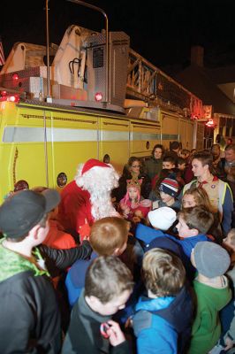 Rochester Christmas Tree Lighting
Rochester held its annual tree lighting on Monday night, December 7, in front of the Town Hall. Hundreds attended and greeted jolly old Saint Nick as he rode in on the town’s new yellow fire tower truck. RMS students in the band and chorus sang Christmas carols and guests enjoyed complimentary cider and cocoa inside Town Hall afterwards. Photos by Colin Veitch
