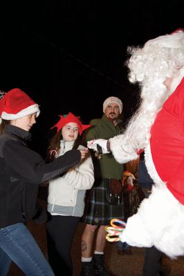 Rochester Christmas Tree Lighting
Rochester held its annual tree lighting on Monday night, December 7, in front of the Town Hall. Hundreds attended and greeted jolly old Saint Nick as he rode in on the town’s new yellow fire tower truck. RMS students in the band and chorus sang Christmas carols and guests enjoyed complimentary cider and cocoa inside Town Hall afterwards. Photos by Colin Veitch
