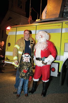 Rochester Christmas Tree Lighting
Rochester held its annual tree lighting on Monday night, December 7, in front of the Town Hall. Hundreds attended and greeted jolly old Saint Nick as he rode in on the town’s new yellow fire tower truck. RMS students in the band and chorus sang Christmas carols and guests enjoyed complimentary cider and cocoa inside Town Hall afterwards. Photos by Colin Veitch
