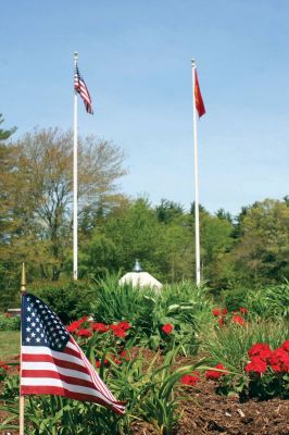 Memorial Day
The second grade of Rochester Memorial School planted flowers donated by the Fire Department at the Memorial last week in preparation for Memorial Day. Photo by Paul Lopes. (May 28, 2009 cover)
