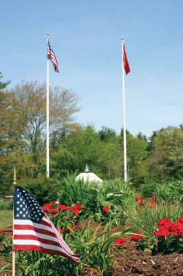 Memorial Day
The second grade of Rochester Memorial School planted flowers donated by the Fire Department at the Memorial last week in preparation for Memorial Day. Photo by Paul Lopes. (May 28, 2009 cover)
