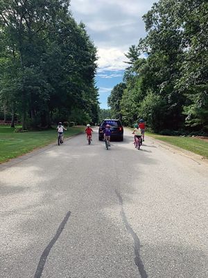 Pan-Mass Challenge
Calib LaRue and Andrew Reveill were riders in the Pan-Mass Challenge and wanted to do something special for the neighborhood kids and have them ride around the neighborhood together before they left for their ride. Rochester Police Department Sergeant Kevin Flynn and Officer Jason Denham took it upon themselves to join us and provide a safe ride with the kids. Photos courtesy Calib LaRue
