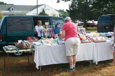 Flea Market Fun
It was impulse-buying heaven at the 36th Annual Arts and Crafts Flea Market on September 5. The First Congregational Church of Rochester hosted the Market, which featured lots of eclectic vendors, baked goods, and local organizations. Photo by Anne O'Brien-Kakley
