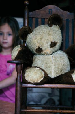 Antiques in Rochester
A teddy bear won at a carnival by Nancy Boutin's father for her mother in the early 1940's was appraised by Frank McNamee for $50 to $75. The chair belonged her Grandmother's aunt Delia, was made around 1890 and was appraised for $175. Unfortunately for collectors, Nancy doesn't plan on parting with these items. Photo by Felix Perez.
