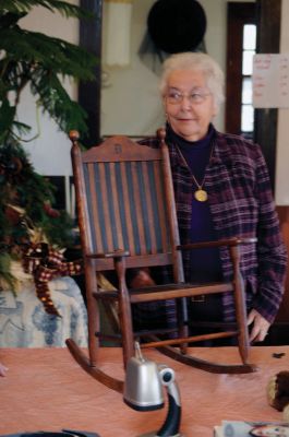 Antiques in Rochester
A teddy bear won at a carnival by Nancy Boutin's father for her mother in the early 1940's was appraised by Frank McNamee for $50 to $75. The chair belonged her Grandmother's aunt Delia, was made around 1890 and was appraised for $175. Unfortunately for collectors, Nancy doesn't plan on parting with these items. Photo by Felix Perez.
