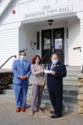 Rochester CARES
Rochester Town Administrator Suzanne Szyndlar receives the town's third COVID-19 reimbursement check under the CARES Act on April 30 at Town Hall. The program is administered locally by Plymouth County. Joining Szyndlar are County Commissioner Jared Valanzola( left), and County Treasurer Tom O'Brien. Photo by Mick Colageo
