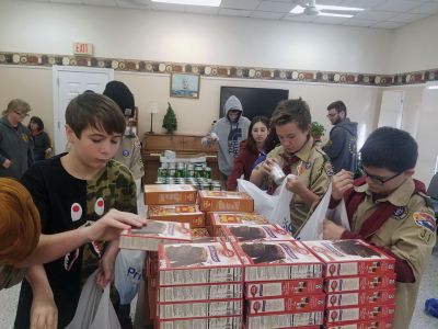 Rochester Scout
Rochester Lions Club members joined forces again on December 15 with Scout Troop 31 and other community volunteers at the Council on Aging to help make the COA’s Christmas Holiday Dinner program successful. Scouts packed 68 Christmas dinner bags of turkey, fresh vegetables, and all the fixings for delivery. The Rochester Lions Club works hard all year to raise the funds to provide these holiday meals at Thanksgiving and Christmas to area seniors and families in need.  
