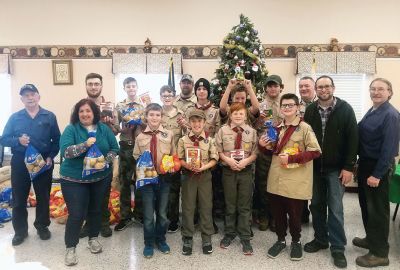Rochester Scout
Rochester Lions Club members joined forces again on December 15 with Scout Troop 31 and other community volunteers at the Council on Aging to help make the COA’s Christmas Holiday Dinner program successful. Scouts packed 68 Christmas dinner bags of turkey, fresh vegetables, and all the fixings for delivery. The Rochester Lions Club works hard all year to raise the funds to provide these holiday meals at Thanksgiving and Christmas to area seniors and families in need.  
