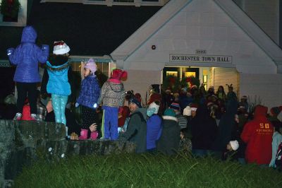 Oh, Christmas tree 
Ho! Ho! Ho! It’s the holiday season in Rochester now that the tree is lit followed by the arrival of jolly old Saint Nick via fire engine on December 4 to usher in the holiday season. The Rochester Memorial School band and chorus treated revelers to a festive performance, while Christmas poster winner Tessa Winslow had the honor of flipping the switch to light the holiday tree. Photos by Jean Perry
