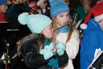 Rochester Tree Lighting
Monday, December 5, was the night of the annual Rochester Tree Lighting. Folks enjoyed festive music by the RMS chorus and band, and witnessed the grand entrance of Santa Claus aboard Rochester’s big yellow fire ladder truck with lights blazing and sirens sounding. Photos by Jean Perry
