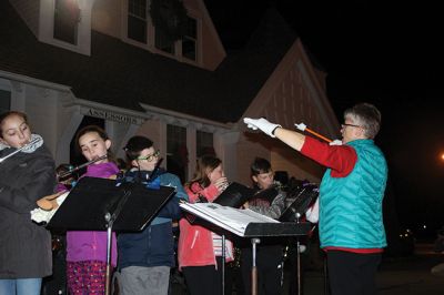 Rochester’s Tree Lighting
Rochester’s star-topped tree outside the Town Hall is dazzling this year with its new multi-colored lights lit for the first time on December 3 for the annual Rochester tree lighting ceremony. The RMS band and chorus kept the festive music going all the way up to Santa’s exciting arrival via fire truck. Photos by Jean Perry
