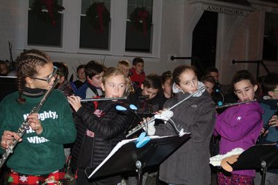 Rochester’s Tree Lighting
Rochester’s star-topped tree outside the Town Hall is dazzling this year with its new multi-colored lights lit for the first time on December 3 for the annual Rochester tree lighting ceremony. The RMS band and chorus kept the festive music going all the way up to Santa’s exciting arrival via fire truck. Photos by Jean Perry
