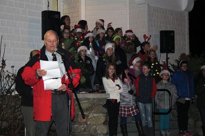 Rochester’s Tree Lighting
Rochester’s star-topped tree outside the Town Hall is dazzling this year with its new multi-colored lights lit for the first time on December 3 for the annual Rochester tree lighting ceremony. The RMS band and chorus kept the festive music going all the way up to Santa’s exciting arrival via fire truck. Photos by Jean Perry
