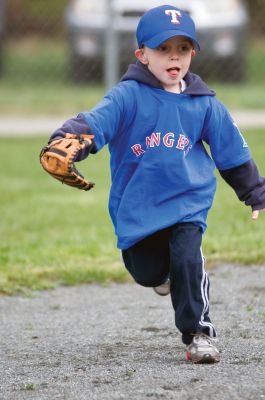 Rochester Youth Baseball 
Rochester Youth Baseball kicked off the 2011 season with a parade to Gifford Park and a flyover.  The Cubs defeated the Royals 11-4 and the Braves and Red Sox played to a score of 10-10 before the game was postponed. Photo by Felix Perez.
