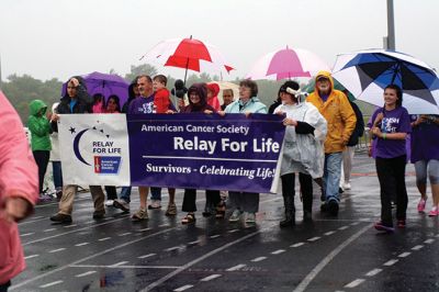 Relay for Life
It rained down hard the night of the 9th annual Relay for Life at Old Rochester Regional, soaking the ground, the tents, and the participants – but it didn’t stop anyone from coming out anyway to walk for a cure and honor those who have battled cancer. The event raised over $42,000 and the proceeds benefit the American Cancer Society. Photos by Jean Perry
