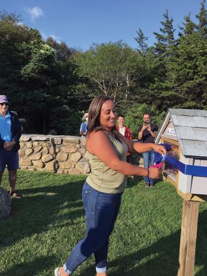 Little Diverse Library
Tangi Thomas of Tri-Town Against Racism takes part in the September 10 ceremonial ribbon cutting for the newest Little Diverse Library at Ned’s Point park in Mattapoisett. Members and supporters of the local anti-racism organization celebrated the realization of the vision of 2020 Keel Award winner Kelsey Robertson, who at age 10 sought to bring books to libraries that reflect the diversity of community children. Little Diverse Libraries are planned for each of the Towns. Photo by Marilou Newell
