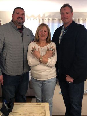 Debbie Martin
Debbie Martin of Mattapoisett (center) displays seven championship rings with Joe Andruzzi (left) and Russ Hochstein.
