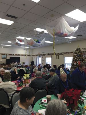 Rochester Council on Aging
The Rochester Council on Aging hosted its annual New Year’s Eve luncheon and celebration on December 31. Nearly 100 people enjoyed mellow music provided by local artist Rick LeBlanc and plates heaped with Chinese food. Photo by Marilou Newell
