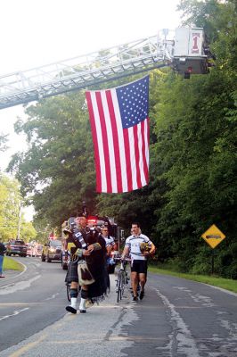 Firefighters Memorial 
Eight firefighters – four from Rochester – followed bagpiper Iain Massie to the Firefighters Memorial the morning of 8/24 to begin the inaugural four-day, 316-mile long Southern New England Brotherhood Ride, organized by Rochester Firefighter Andy Weigel. The ride was to remember 14 who lost their lives in the line of duty this past year. Photos by Jean Perry
