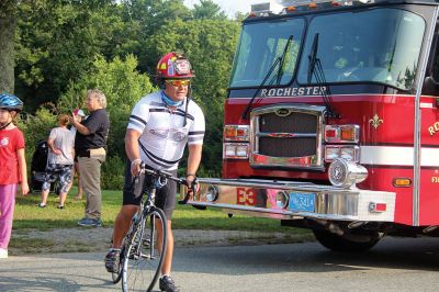 Firefighters Memorial 
Eight firefighters – four from Rochester – followed bagpiper Iain Massie to the Firefighters Memorial the morning of 8/24 to begin the inaugural four-day, 316-mile long Southern New England Brotherhood Ride, organized by Rochester Firefighter Andy Weigel. The ride was to remember 14 who lost their lives in the line of duty this past year. Photos by Jean Perry
