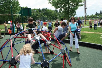 Grand Opening
Rochester pulled out all of the stops as the town dedicated the Dexter Lane Community Playground on Sunday, May 31. The three-hour long dedication ceremony and party included awards of recognition for the many volunteers who helped bring the project to life while offering plenty of food and entertainment to the residents of Rochester. Photo by Robert Chiarito
