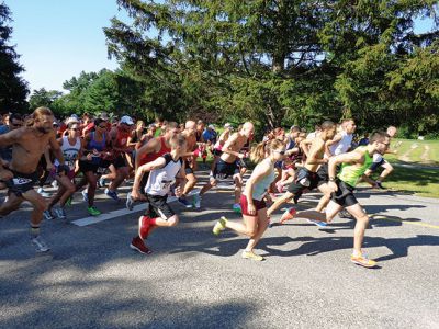 Rochester Road Race
There were 225 runners who competed in the 9th Annual Rochester Road Race on August 9 to raise money and collect food for The Food Pantry at Damien’s Place in Wareham. The 5K race kicked off at Dexter Lane and runners enjoyed perfect running weather for the occasion. Photos by Chuck Kantner
