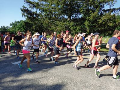 Rochester Road Race
There were 225 runners who competed in the 9th Annual Rochester Road Race on August 9 to raise money and collect food for The Food Pantry at Damien’s Place in Wareham. The 5K race kicked off at Dexter Lane and runners enjoyed perfect running weather for the occasion. Photos by Chuck Kantner
