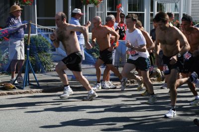 2010 Road Race
Mattapoisetts 40th Road Race took place on the steamy Saturday morning of July 3, 2010. Over a thousand runners registered for the highly anticipated annual five-mile event. Photo by Anne OBrien-Kakley.
