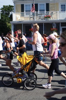 2010 Road Race
Mattapoisetts 40th Road Race took place on the steamy Saturday morning of July 3, 2010. Over a thousand runners registered for the highly anticipated annual five-mile event. Photo by Anne OBrien-Kakley.
